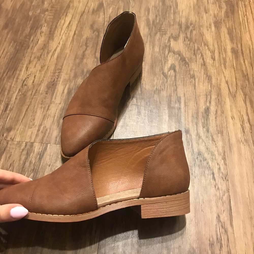Brown leather flats